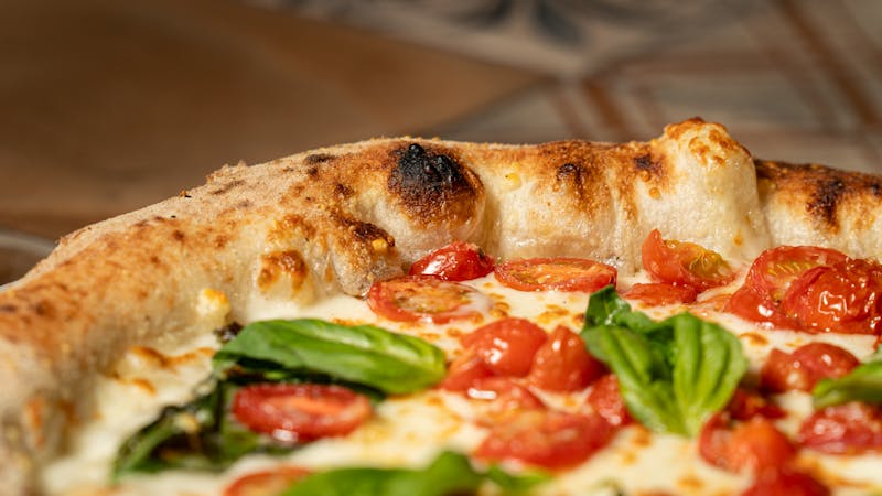 Classic Margherita pizza with fresh mozzarella and basil